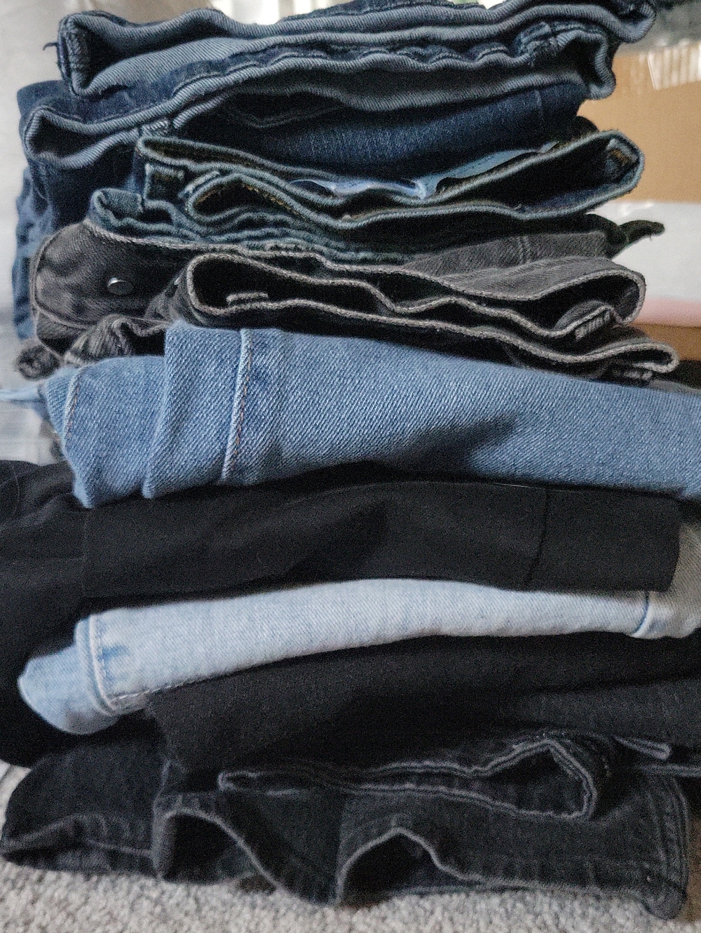 9 Pair Of Women's Black and Blue Denim Jeans Stack